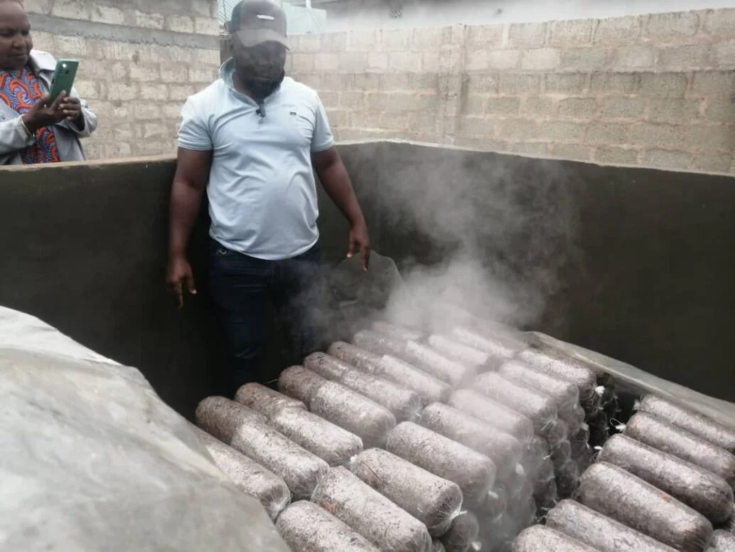 Shaban Kabanga of Temise Tanzania Illustrating "his" DIY oyster Pasteurization Chamber Works.